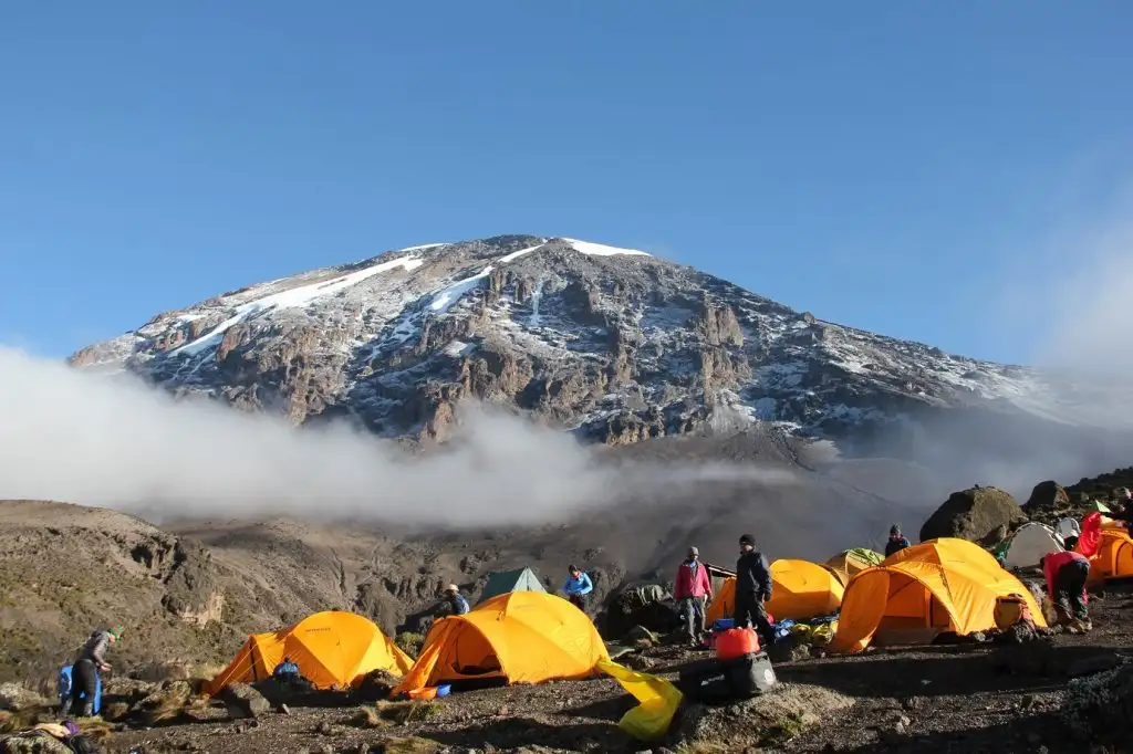 Campsite layout graphic with tent zones and toilet areas - Climb Mount Kilimanjaro